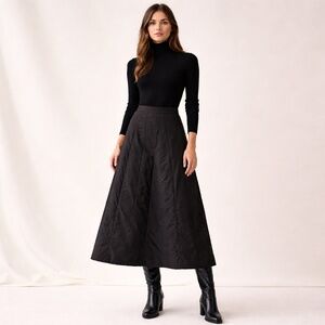 Mexx Black A-Line Maxi Skirt out of VERY thin puffer quilted material.